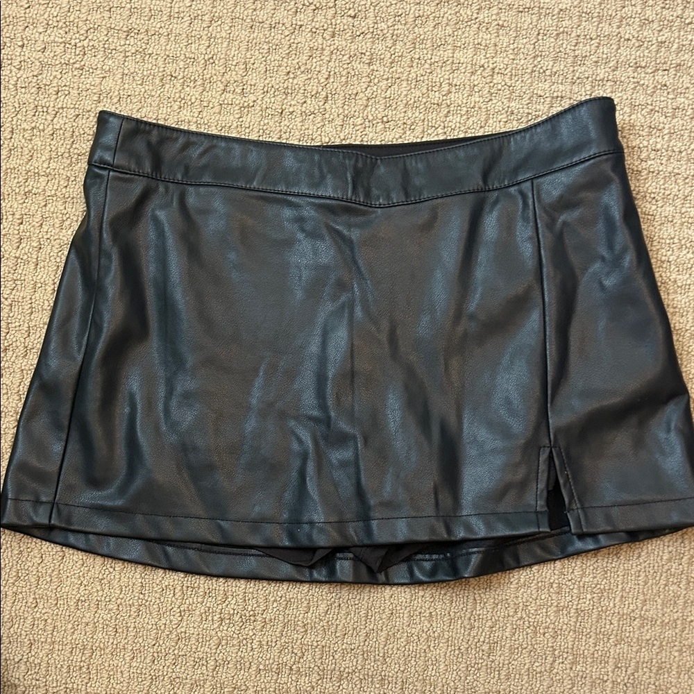 Black faux leather skirt from Garage